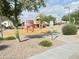 Community playground featuring play equipment and recreational space for residents at 3402 N 300Th Dr, Buckeye, AZ 85396