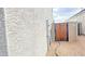 Well-maintained side yard with a wooden gate at 3402 N 300Th Dr, Buckeye, AZ 85396