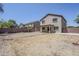 Large fenced backyard, patio, desert landscaping, and two-story home at 3405 W La Salle St, Phoenix, AZ 85041