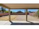 Covered patio view of the private backyard with gravel landscaping and block wall at 3405 W La Salle St, Phoenix, AZ 85041