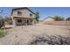 Large fenced backyard with desert landscaping, patio and two-story home at 3405 W La Salle St, Phoenix, AZ 85041