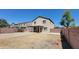Two-story home with covered patio overlooking the private backyard at 3405 W La Salle St, Phoenix, AZ 85041