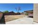 Large backyard with gravel landscaping, desert plants, and block wall at 3405 W La Salle St, Phoenix, AZ 85041
