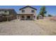 Large fenced backyard with desert landscaping, patio and two-story home at 3405 W La Salle St, Phoenix, AZ 85041