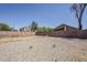 View of the fenced backyard featuring desert landscaping at 3405 W La Salle St, Phoenix, AZ 85041
