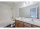 Bathroom featuring double sinks and bath and shower combo at 3405 W La Salle St, Phoenix, AZ 85041