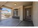 Covered entryway featuring a decorative front door and window at 3405 W La Salle St, Phoenix, AZ 85041