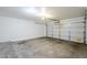 Garage with painted walls and a large garage door at 3405 W La Salle St, Phoenix, AZ 85041