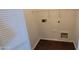 Small laundry room featuring a wire shelf and vinyl flooring at 3405 W La Salle St, Phoenix, AZ 85041