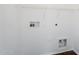Bright laundry room with white walls and hookups at 3405 W La Salle St, Phoenix, AZ 85041
