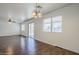 Spacious living area with a ceiling fan, lots of light, and sliding glass doors to the backyard at 3405 W La Salle St, Phoenix, AZ 85041