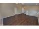 Open loft area on the second floor, showcasing the vinyl flooring and ceiling fan at 3405 W La Salle St, Phoenix, AZ 85041
