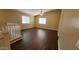 Second floor loft features vinyl floors, a ceiling fan and plenty of light at 3405 W La Salle St, Phoenix, AZ 85041