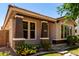 Attractive home with stone accents, colorful landscaping, and well-maintained lawn at 3477 E Sheffield Rd, Gilbert, AZ 85296