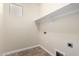 Utility room featuring tile flooring and a shelf for storage at 3477 E Sheffield Rd, Gilbert, AZ 85296