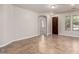 Open concept living room with tile floors, neutral walls and lots of space at 3477 E Sheffield Rd, Gilbert, AZ 85296