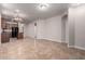 Bright living space with view of kitchen area, with ample room for dining and entertaining at 3477 E Sheffield Rd, Gilbert, AZ 85296