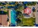 Scenic aerial view of a community pool with swimming lanes and a splash pad at 36298 N Crucillo Dr, Queen Creek, AZ 85140