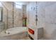 Elegant bathroom featuring a standalone tub and a walk-in shower with high-end finishes at 36298 N Crucillo Dr, Queen Creek, AZ 85140
