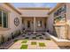 Exterior view of front entryway with desert landscaping, tiled entryway and water feature at 36298 N Crucillo Dr, Queen Creek, AZ 85140
