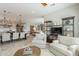 Bright, open living space with a view of the dining area and featuring a comfortable seating area at 36298 N Crucillo Dr, Queen Creek, AZ 85140