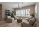 Comfortable living room with tile floors and recessed lights provides ample seating and natural light at 36298 N Crucillo Dr, Queen Creek, AZ 85140