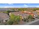 Aerial shot of home showcasing tile roof, mature landscaping, and convenient community location at 3872 E Jude Ln, Gilbert, AZ 85298