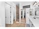 Bright bathroom showcasing double sinks, a large mirror, and a tiled walk-in shower, perfect for everyday use at 3872 E Jude Ln, Gilbert, AZ 85298