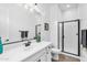 Bright bathroom showcasing a single sink, a mirror, and a stylish framed glass shower at 3872 E Jude Ln, Gilbert, AZ 85298