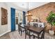 Dining room featuring modern decor, a stylish light fixture, and ample natural light at 3872 E Jude Ln, Gilbert, AZ 85298