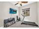 Versatile exercise room with a treadmill, TV, and ample space for equipment at 3872 E Jude Ln, Gilbert, AZ 85298