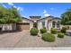 Well-maintained home with a two-car garage and a meticulously landscaped front yard at 3872 E Jude Ln, Gilbert, AZ 85298