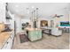 Bright, open kitchen with a center island, modern appliances, and tile floors at 3872 E Jude Ln, Gilbert, AZ 85298