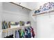 Organized walk-in closet with clothing rods, shelves, and ample storage space at 3872 E Jude Ln, Gilbert, AZ 85298