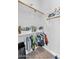 Functional walk-in closet with rods and shelves, ideal for organization at 3872 E Jude Ln, Gilbert, AZ 85298