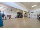 Clean and spacious garage with epoxy flooring and plenty of space at 40725 W Hall Dr, Maricopa, AZ 85138