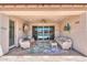 Inviting outdoor patio with comfortable seating and a view of the pool at 40725 W Hall Dr, Maricopa, AZ 85138