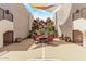 Spacious courtyard patio features outdoor seating and a fire pit at 4120 N 78Th St # 216, Scottsdale, AZ 85251