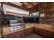 Outdoor grill with stainless steel grill, sink and dark backsplash at 4120 N 78Th St # 216, Scottsdale, AZ 85251