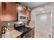 Well-equipped kitchen features granite countertops, stainless steel appliances, and ample cabinet space at 4120 N 78Th St # 216, Scottsdale, AZ 85251