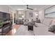 Comfortable living room with a fireplace, stylish decor, and a view to the outside patio for relaxed living at 4120 N 78Th St # 216, Scottsdale, AZ 85251