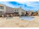Community pool and hot tub with lounge seating, landscaping and building exterior at 4120 N 78Th St # 216, Scottsdale, AZ 85251