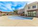 Community outdoor pool featuring a gated area with lounge seating at 4120 N 78Th St # 216, Scottsdale, AZ 85251