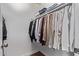Organized walk-in closet with ample hanging space and shelving, providing convenient storage solutions at 4120 N 78Th St # 216, Scottsdale, AZ 85251