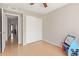 Bright bedroom featuring tiled floors and a closet at 4629 N 78Th Dr, Phoenix, AZ 85033