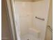 Shower room featuring bright white tiles and grab bars for accessibility at 5402 E Mckellips Rd # 103, Mesa, AZ 85215