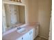 Bathroom featuring a vanity, sink, and mirrored medicine cabinet at 5402 E Mckellips Rd # 103, Mesa, AZ 85215