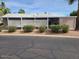Well-maintained single-story home with white trim, lattice and mature shrubbery at 5402 E Mckellips Rd # 103, Mesa, AZ 85215