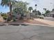 Charming single-story home with well-maintained landscaping and a covered parking area at 5402 E Mckellips Rd # 103, Mesa, AZ 85215