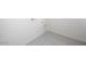 Simple utility room with tile flooring and hookups for a washer and dryer at 5761 E Iris Dr, Florence, AZ 85132